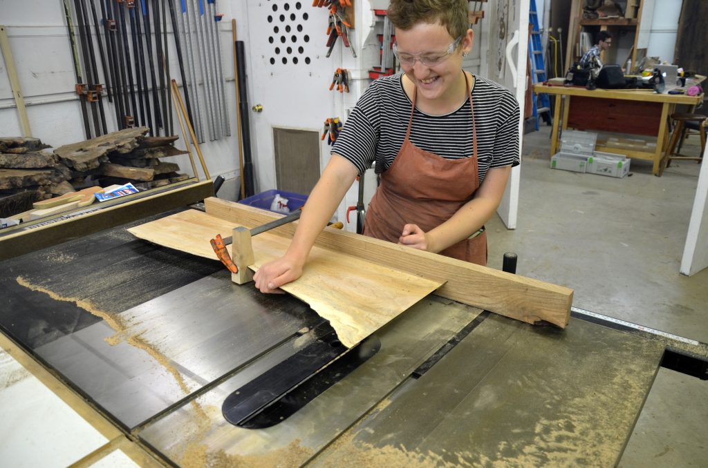We added accuracy to the mitering by clamping the slab to the fence with a tailored cut bracket.
