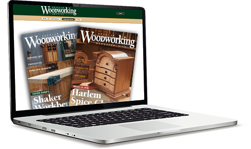 Laptop showing covers of magazines